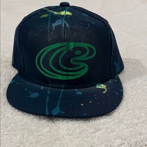 Navy Blue Cap with Green Logo and Paint Splatter